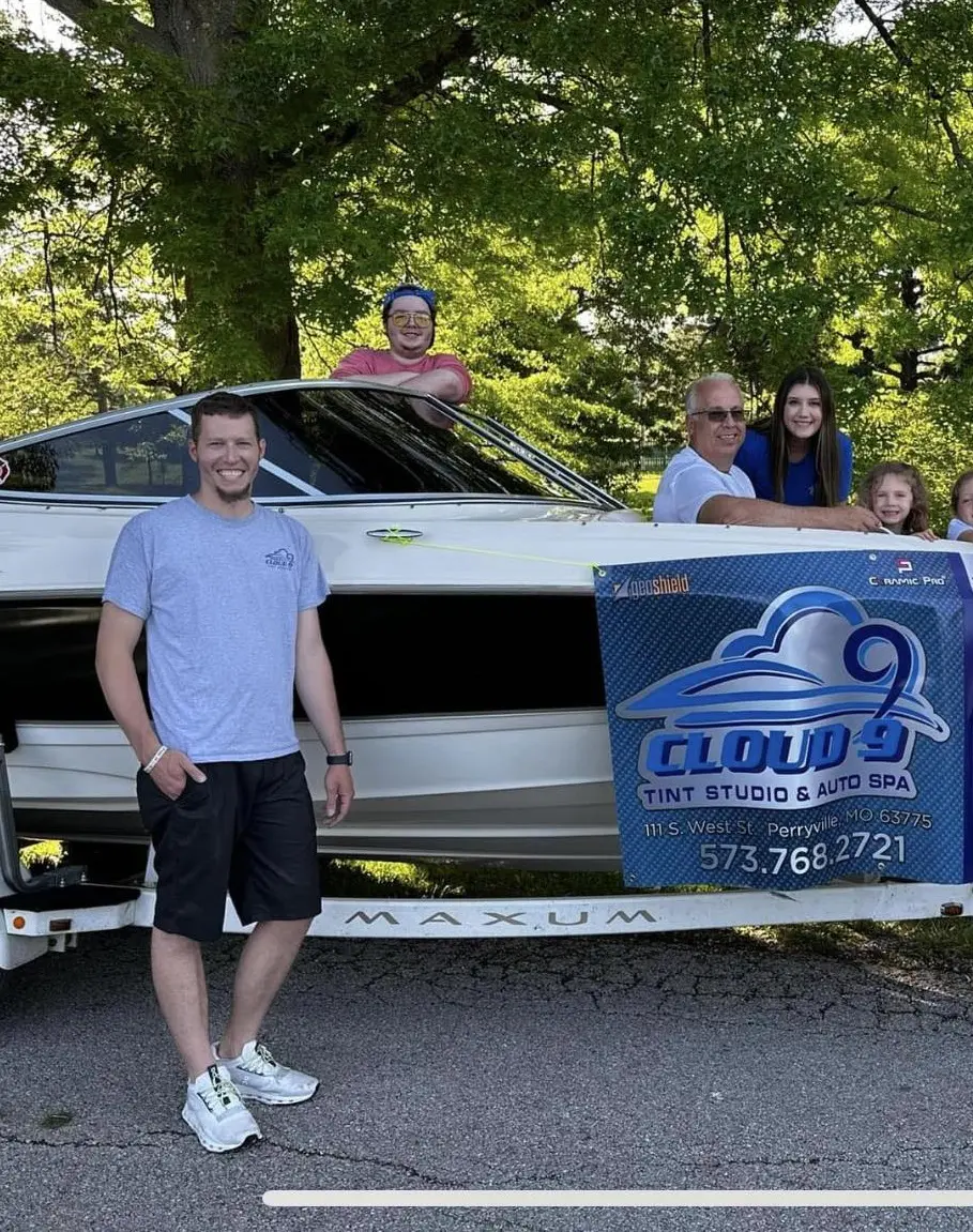 Garrett Brewer with Cloud 9 Tint Studio and Auto Spa vehicle